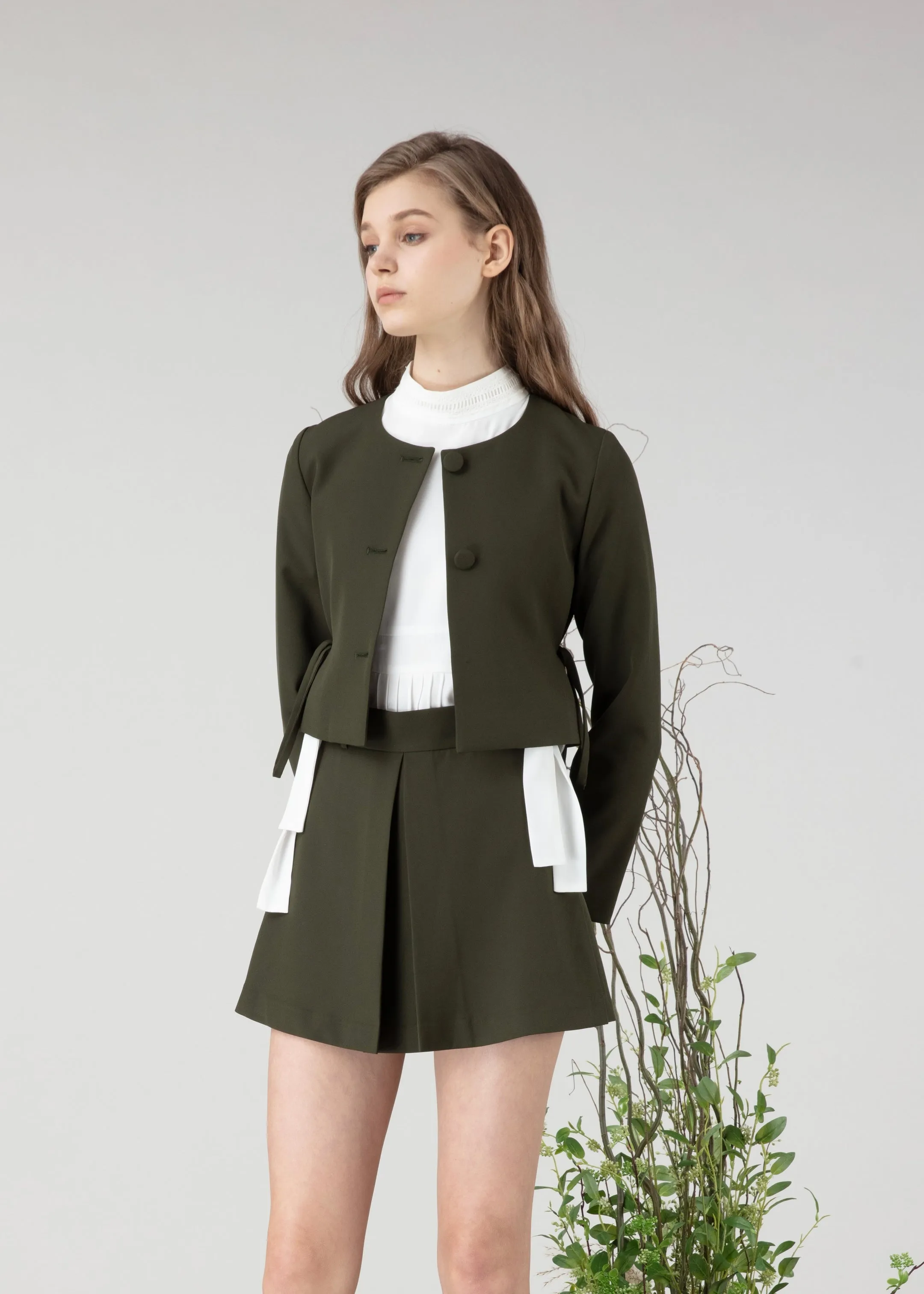 Short skirt in green colour