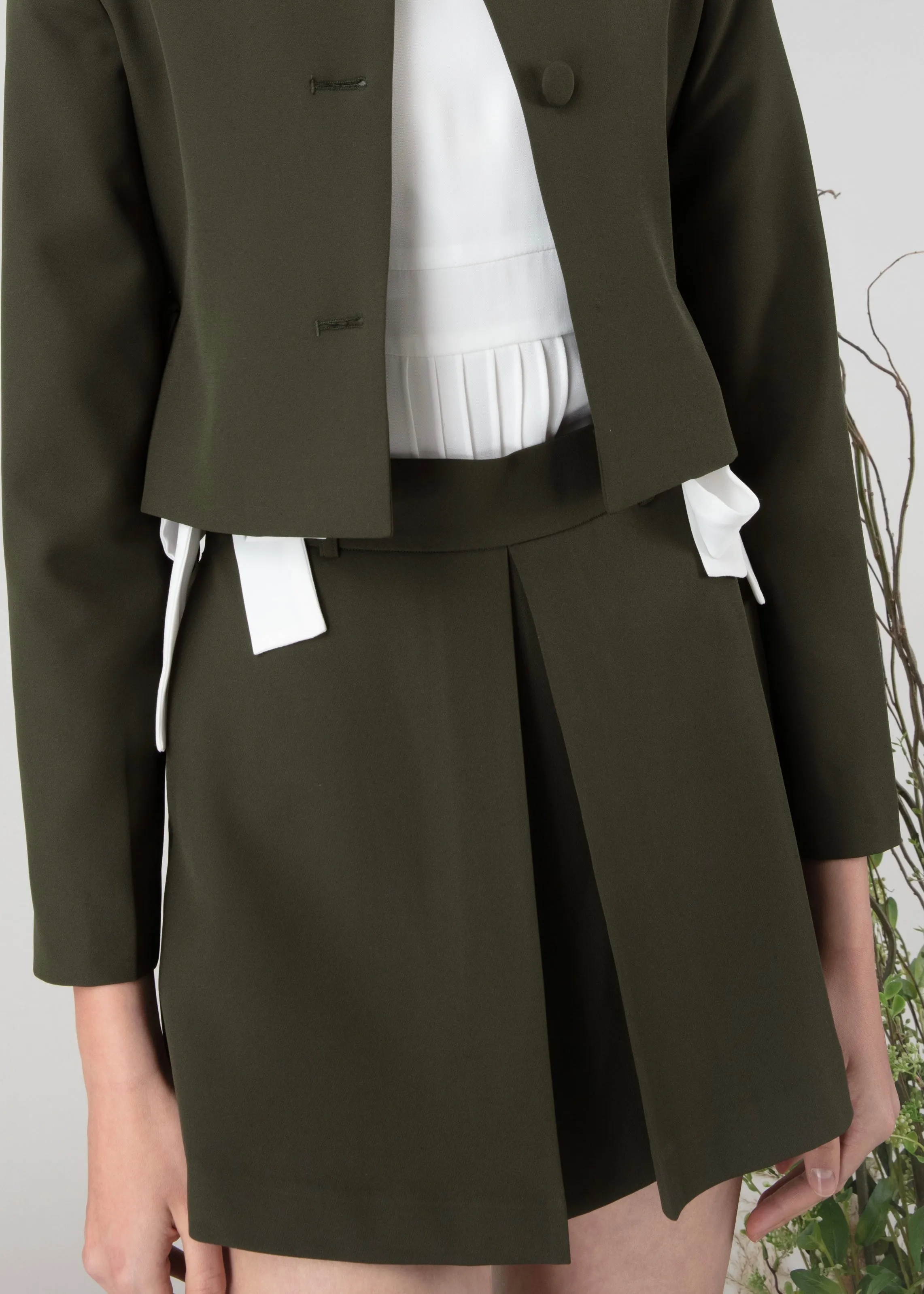 Short skirt in green colour