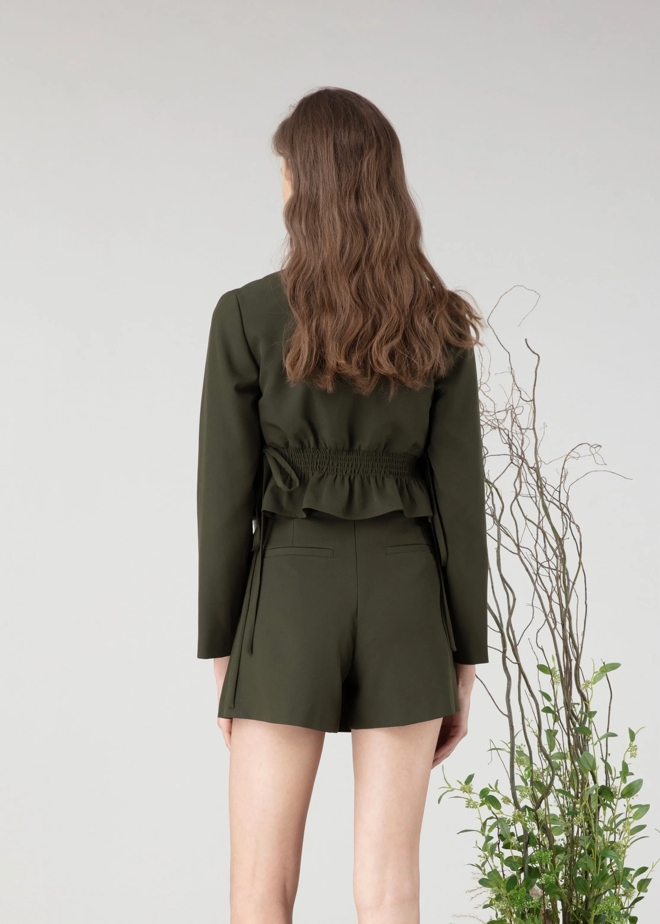 Short skirt in green colour