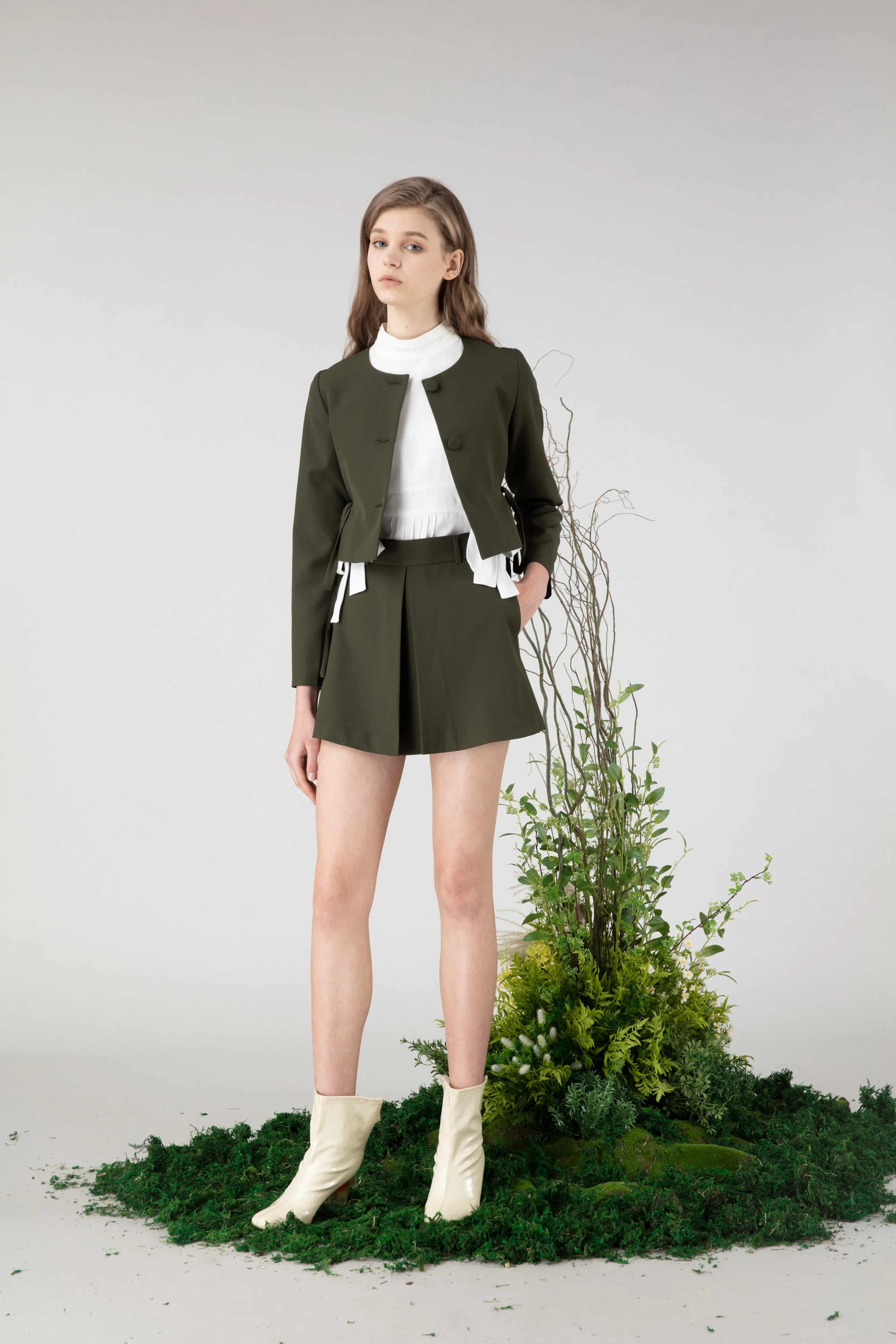 Short skirt in green colour